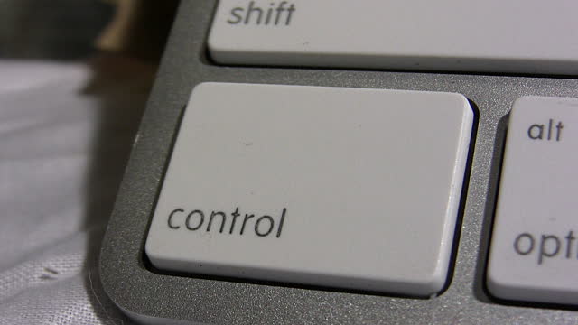 finger-pressing-computer-control-key-vid